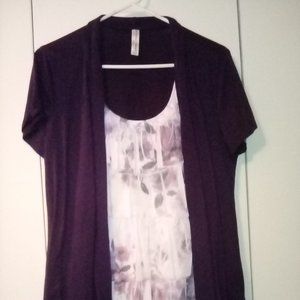 Ladies size large, purple over pretty white flowery design.